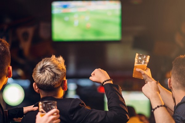 Men watch football banner.jpg