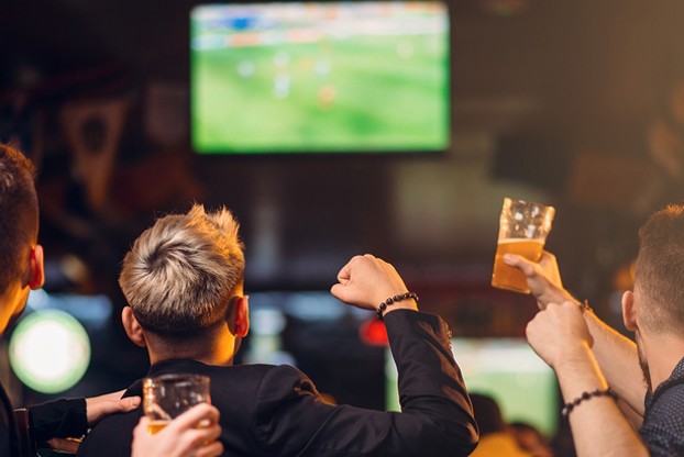 Men watch football banner.jpg