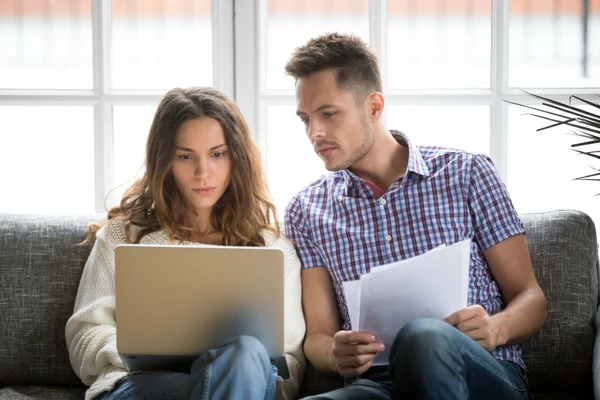 Young Couple Concerned About Money RIFT Tax Refunds